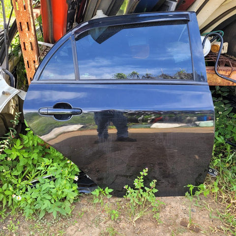 Puerta trasera izq Toyota Corolla 09-13